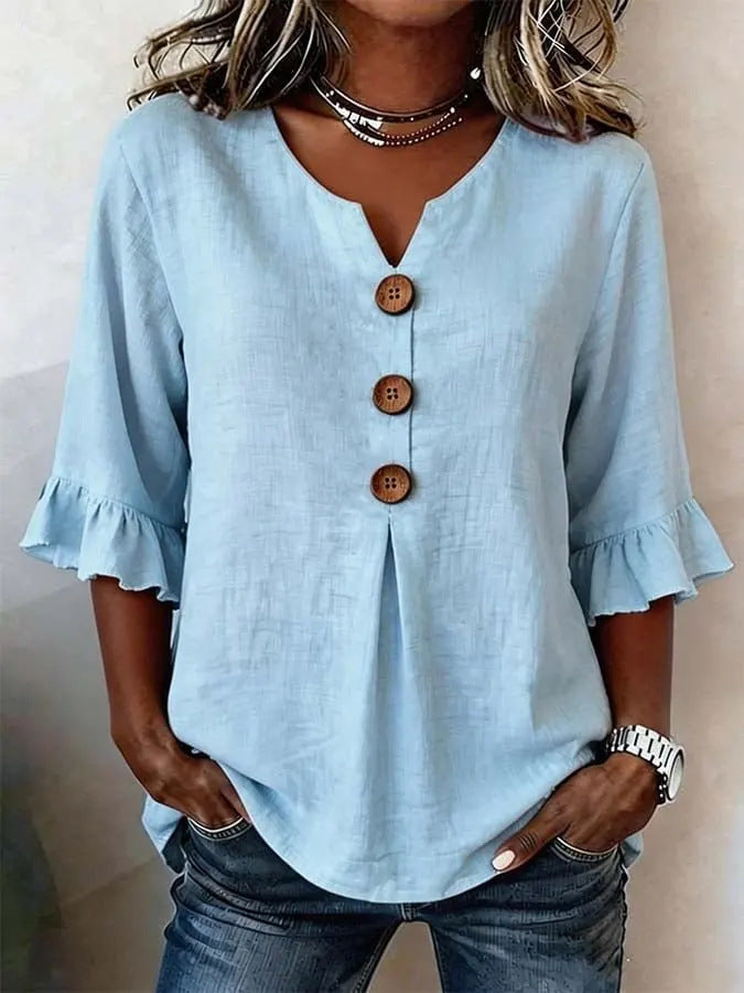 Ruffle button-front blouse in light blue, front view