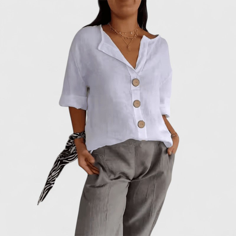 Relaxed fit tunic blouse in black, side view