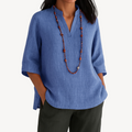 Relaxed linen tunic top in blue, front view