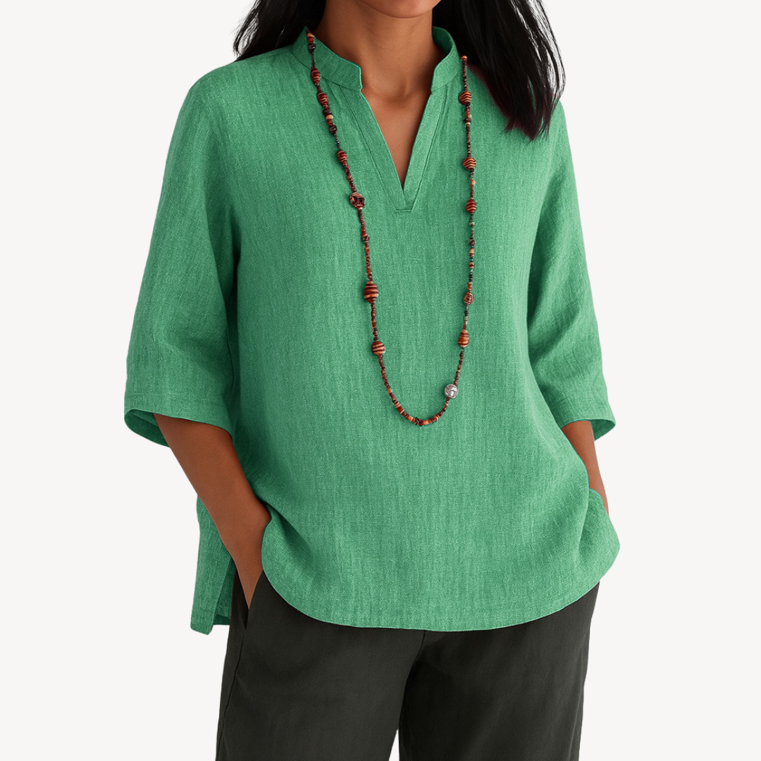 Relaxed linen tunic top in blue, side view