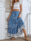 Floral tiered boho maxi skirt in blue, elastic waist flowing front view